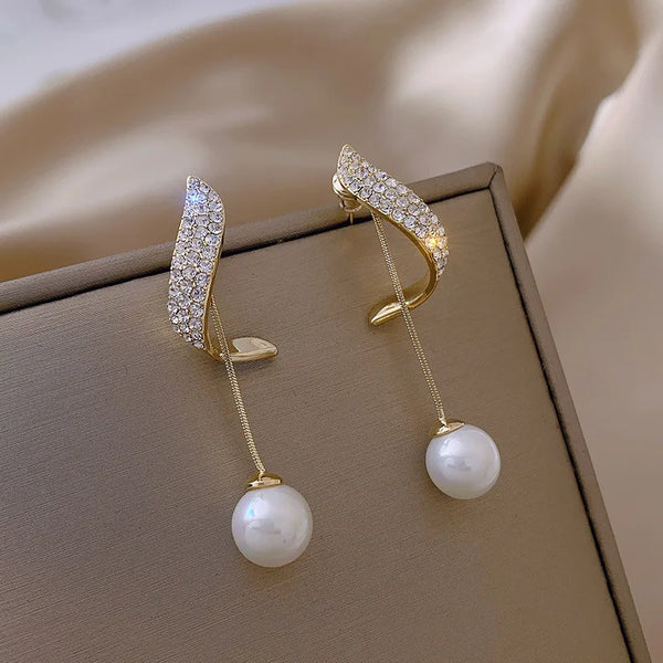 Elegant and classic faux pearl dangle earrings