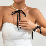 Elegant black ribbon necklace with white imitation pearls for women