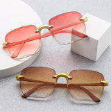 Women's Rimless Sunglasses with Diamond Cut Lenses