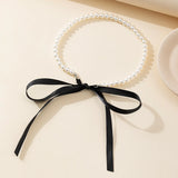 Elegant black ribbon necklace with white imitation pearls for women