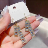 Shiny gold tone stainless steel square zircon hoop earrings for women