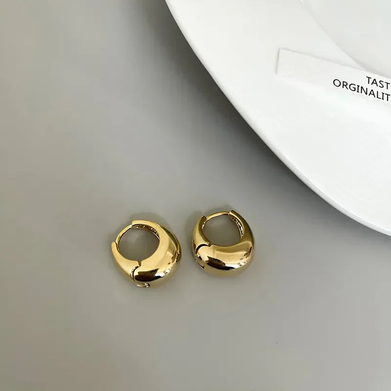 Simple gold-tone silver earrings for women